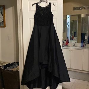 Black dress by Adrianna Papell size 12. Longer in back. Only worn once.